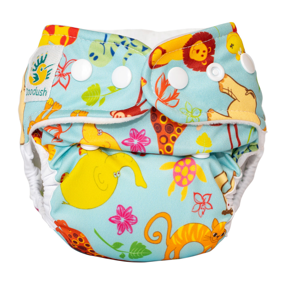 Doodush Überhose V2.0 mit Laschen im Design Blue Safari (Wilde Tiere), Größe Newborn