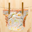Culla di Teby Höschenwindel mit Pocketfunktion im Design Happy Rabbits auf der Wäscheleine