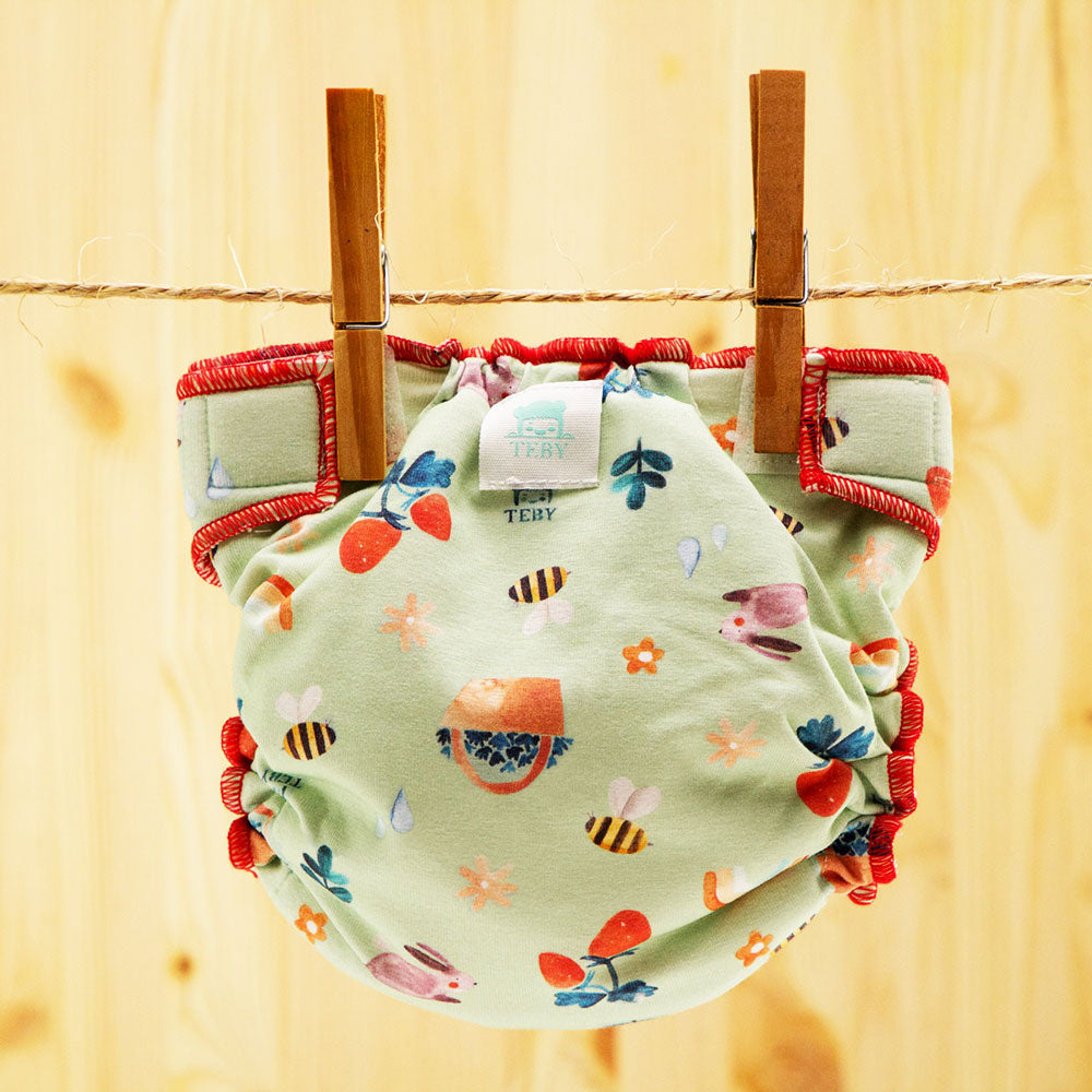 Culla di Teby Höschenwindel mit Pocketfunktion im Design Season Moods auf der Wäscheleine (weitere Ansicht)