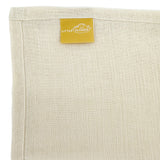 Ecke einer Little Clouds Mullwindel aus Baumwolle mit goldenem Etikett
