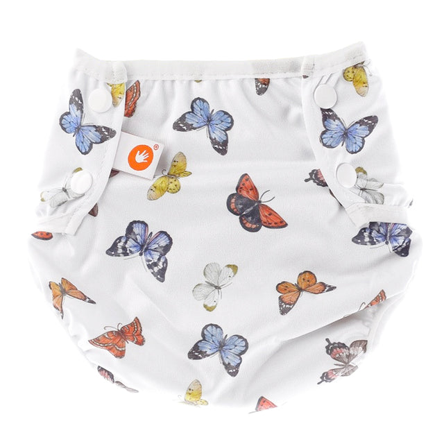XKKO waschbare Schwimmwindel One Size (4–15 kg) im Design Butterflies (Schmetterlinge) von vorn mit Druckknöpfen